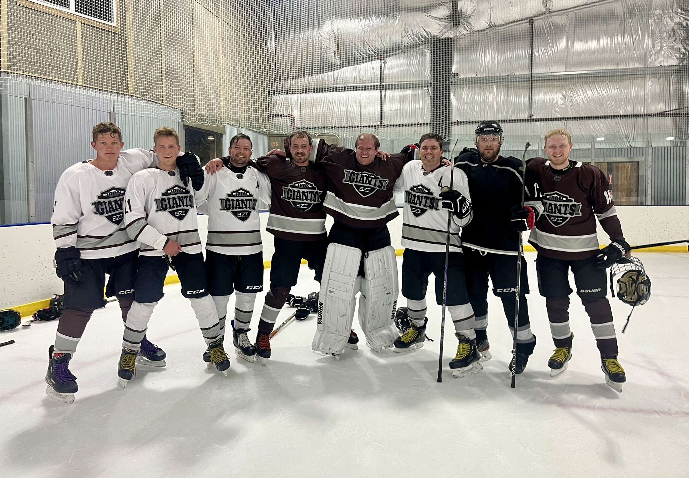 EJ with the team at the hockey rink