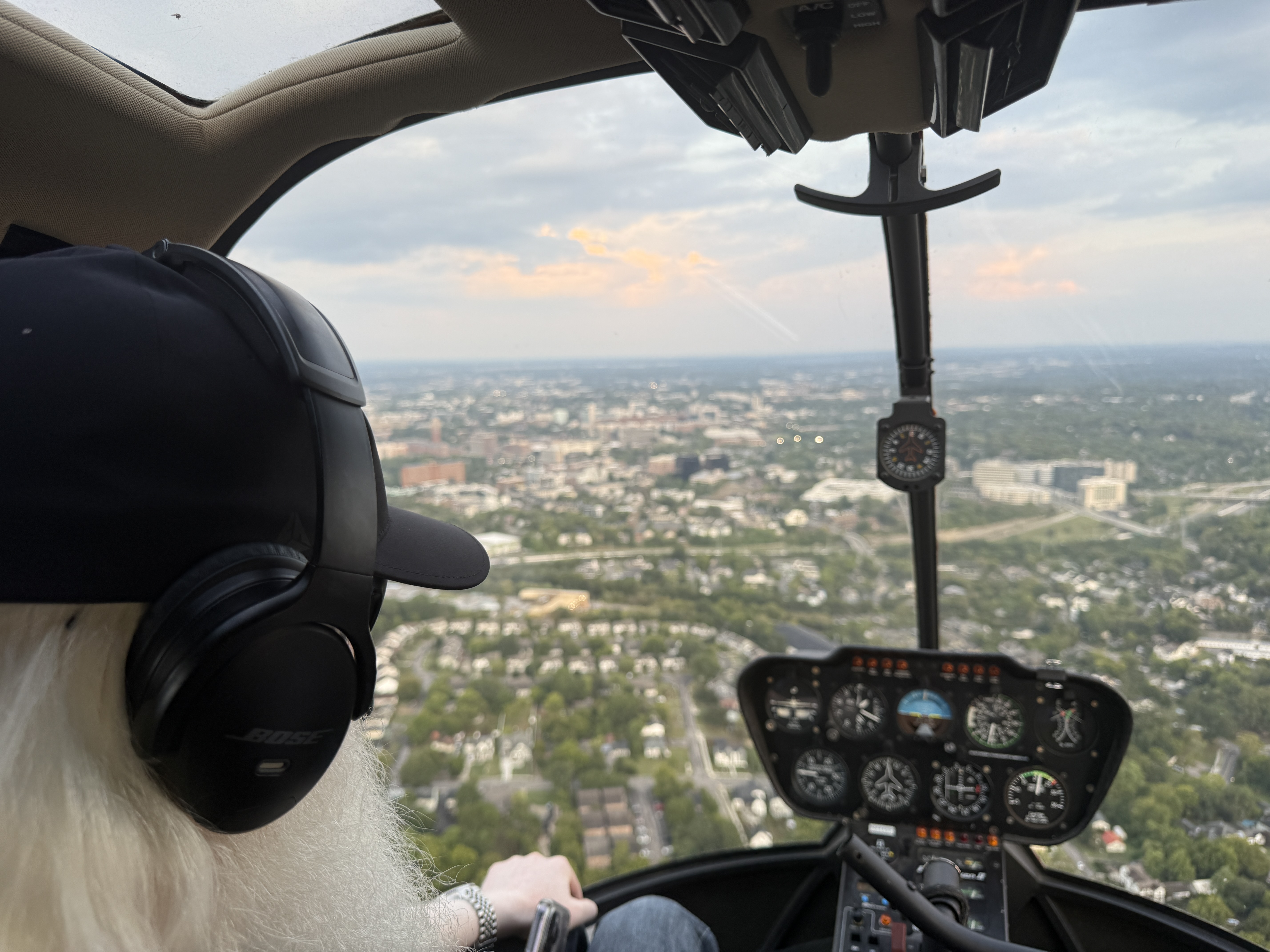 Wayne in a helicopter cockpit